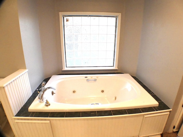 full bath with a jetted tub