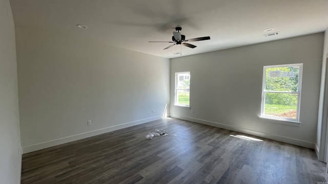 8 Dandelion, Greenbrier, AR 72058 - spare room with plenty of natural light, baseboards, and dark wood finished floors