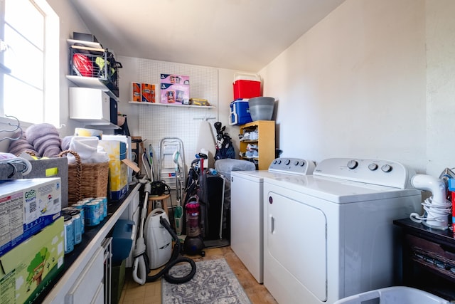 laundry area featuring laundry area and washer and clothes dryer