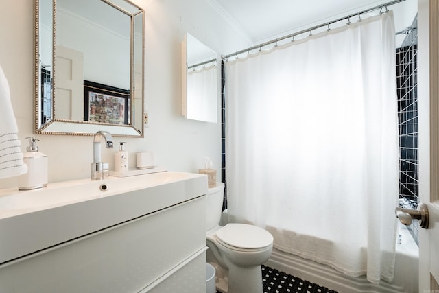 bathroom featuring vanity, ornamental molding, shower / bath combo with shower curtain, and toilet