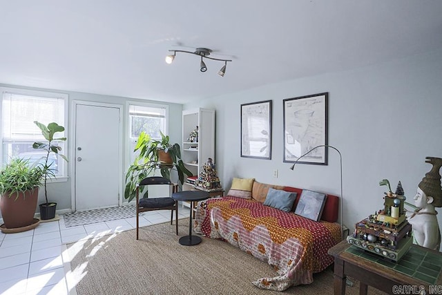 sitting room featuring light tile patterned floors