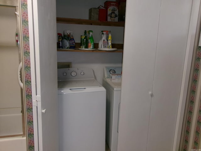 laundry area featuring laundry area and independent washer and dryer