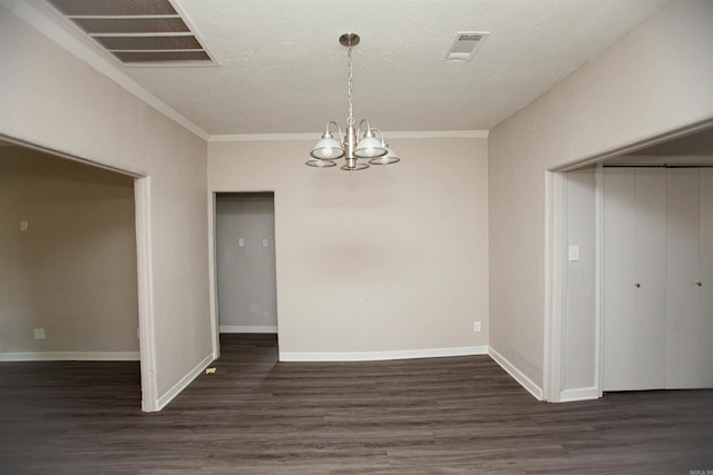 unfurnished dining area featuring dark wood-style floors, visible vents, and a notable chandelier