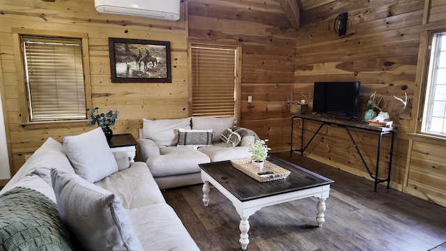 living area with a wall unit AC, wood walls, and dark wood-type flooring