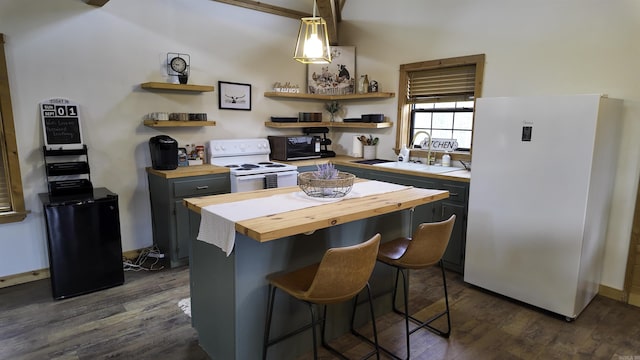 kitchen with decorative light fixtures, open shelves, wooden counters, white appliances, and a kitchen breakfast bar