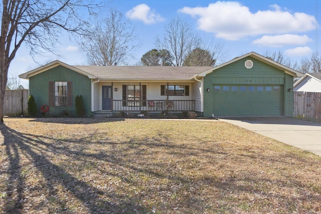 single story home featuring a garage, driveway, covered porch, fence, and brick siding