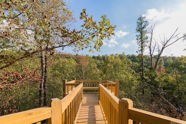 exterior space featuring a forest view