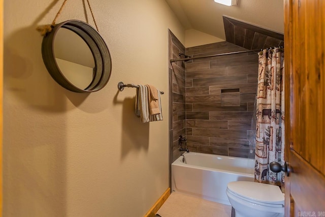 full bathroom with shower / tub combo, toilet, and tile patterned floors