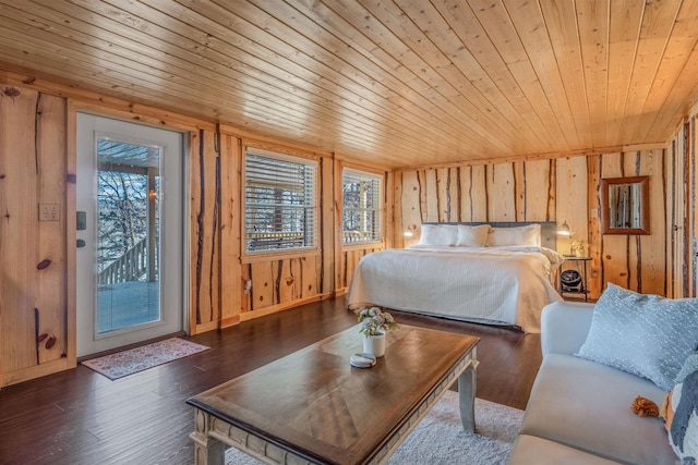 bedroom featuring wood walls, wood ceiling, access to outside, and wood finished floors