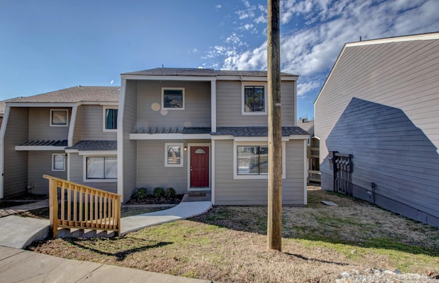 view of front of home with a front lawn