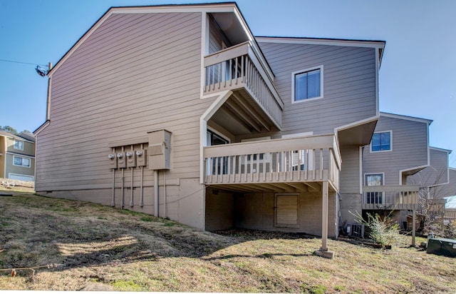 rear view of property with central air condition unit