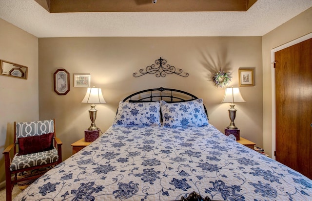 bedroom featuring a textured ceiling