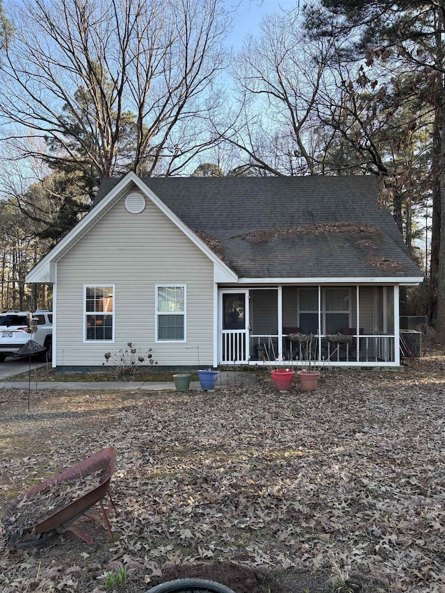 view of front of home featuring a shingled roof