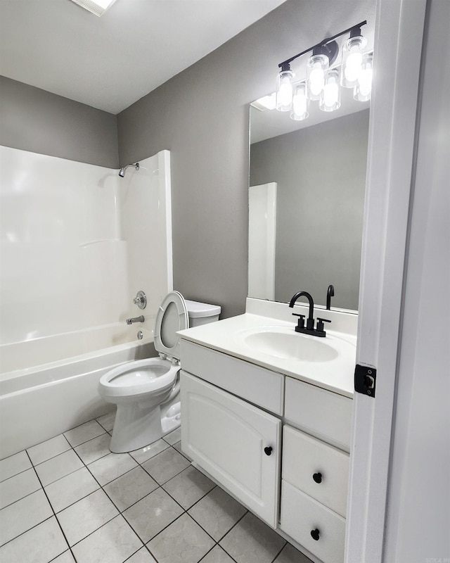 bathroom with toilet, tub / shower combination, tile patterned flooring, and vanity