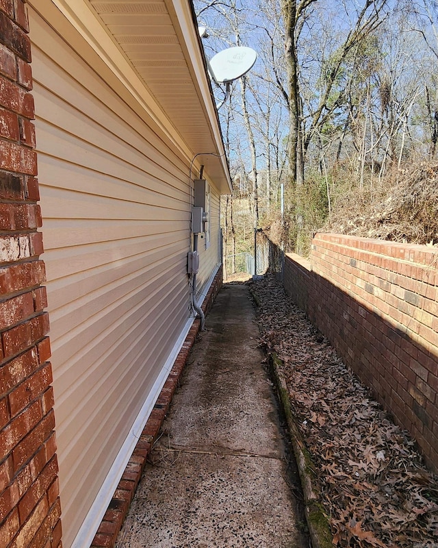 view of property exterior with fence