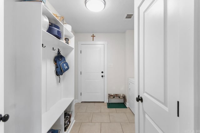 mudroom featuring visible vents and light tile patterned flooring