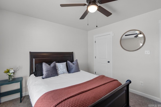 bedroom with carpet, baseboards, and a ceiling fan