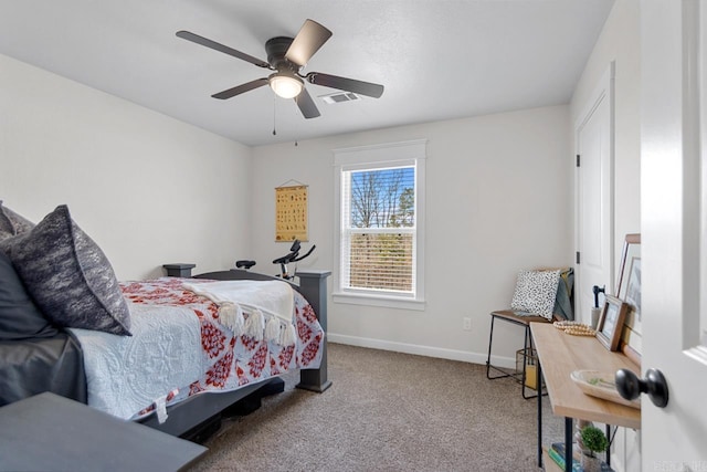 bedroom featuring visible vents, baseboards, a ceiling fan, and light colored carpet