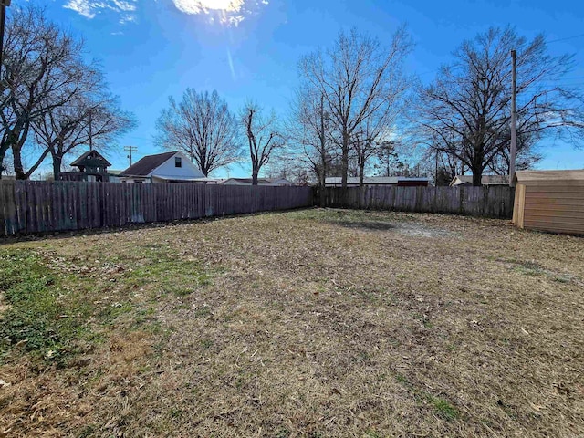 view of yard with a fenced backyard