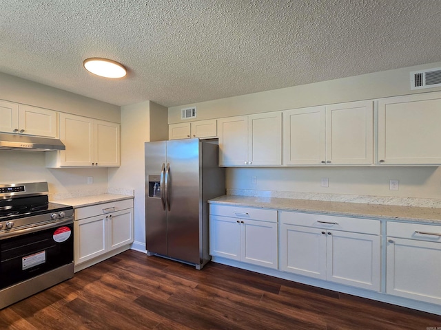 kitchen featuring visible vents, appliances with stainless steel finishes, dark wood-type flooring, white cabinets, and under cabinet range hood