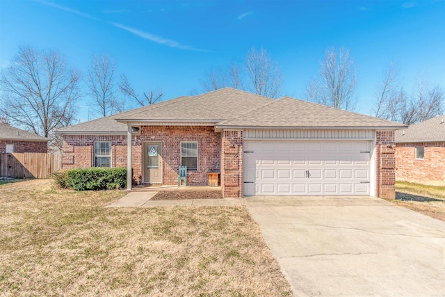 single story home featuring a garage, fence, concrete driveway, and brick siding