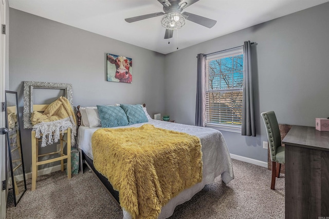 bedroom featuring a ceiling fan, carpet flooring, and baseboards