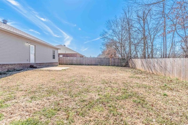 view of yard featuring a fenced backyard