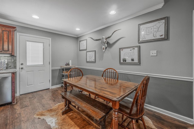 dining room featuring ornamental molding, recessed lighting, baseboards, and dark wood-style floors