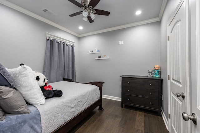 bedroom with dark wood-style floors, baseboards, visible vents, and crown molding