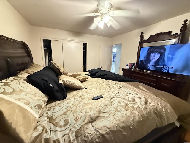 bedroom with ceiling fan and a closet