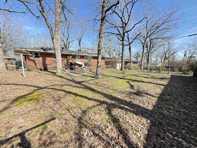 view of yard featuring fence