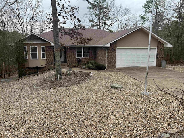 ranch-style house with concrete driveway, brick siding, an attached garage, and a shingled roof