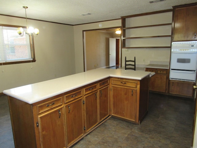 kitchen featuring dark floors, light countertops, white oven, a warming drawer, and open shelves