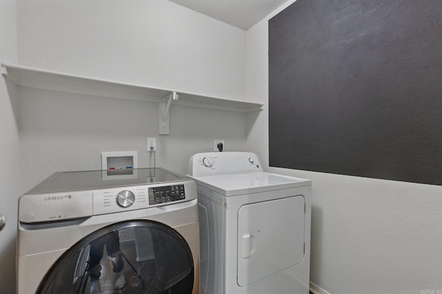 laundry area with laundry area and washer and dryer