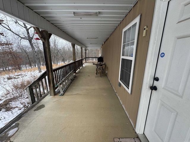 view of snow covered patio