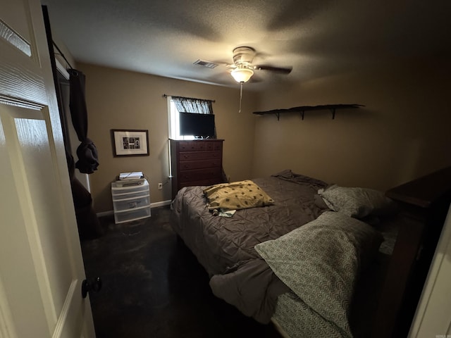 bedroom with baseboards, visible vents, dark colored carpet, and a ceiling fan