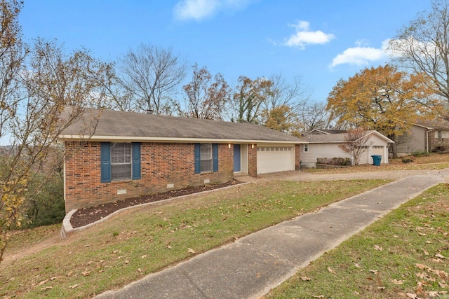 ranch-style home with an attached garage, brick siding, driveway, crawl space, and a front yard