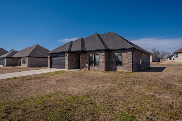 view of front facade with a garage, brick siding, driveway, roof with shingles, and a front lawn