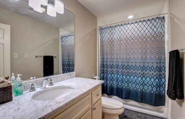 full bathroom featuring shower / tub combo with curtain, vanity, and toilet