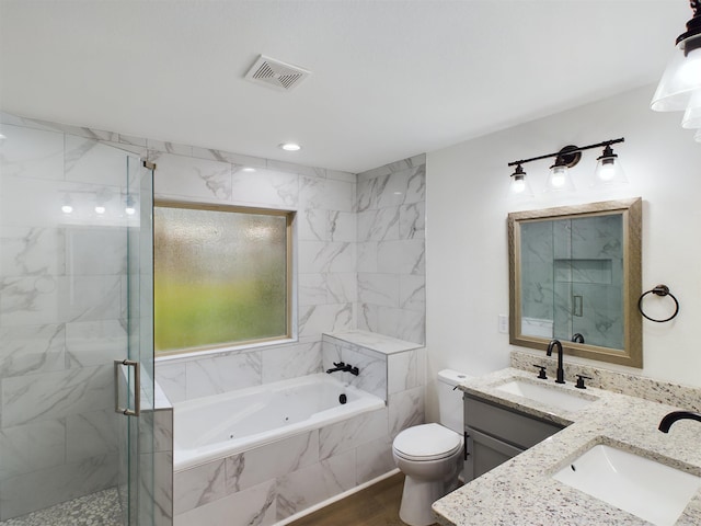 full bathroom with a whirlpool tub, a stall shower, a sink, and visible vents