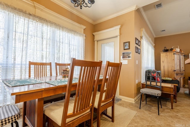 dining area featuring light tile patterned floors, baseboards, visible vents, and crown molding