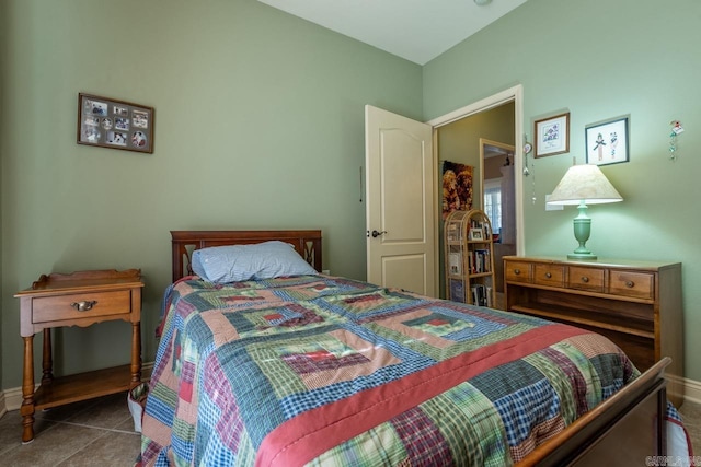 tiled bedroom with baseboards