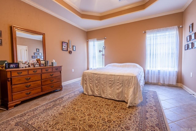 bedroom with a tray ceiling, crown molding, and light tile patterned floors