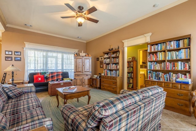 living room featuring light tile patterned floors, ceiling fan, visible vents, and crown molding