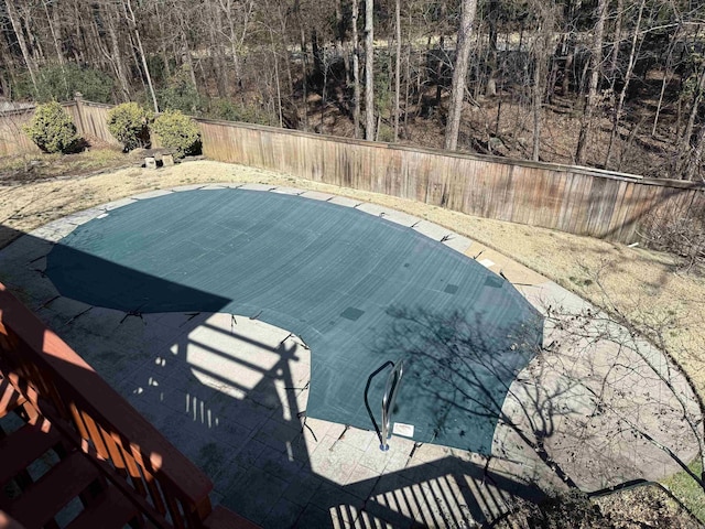 view of pool featuring a fenced backyard