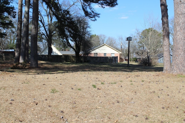 view of yard featuring fence