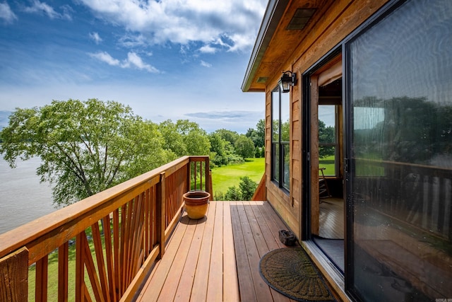 deck featuring a water view