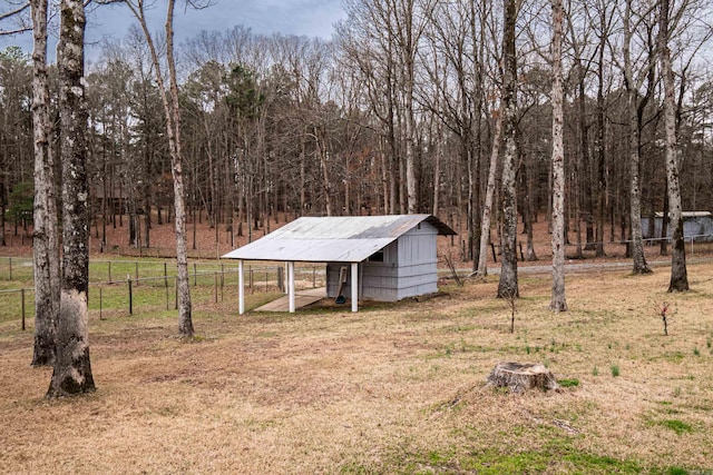 875 Ouachita 64, Camden, AR 71701 - view of yard featuring an outbuilding and fence