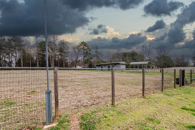 875 Ouachita 64, Camden, AR 71701 - view of yard with a rural view and fence