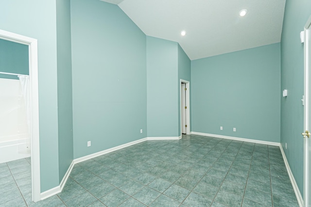 875 Ouachita 64, Camden, AR 71701 - tiled empty room featuring lofted ceiling, recessed lighting, and baseboards